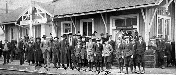 Waiting for the train at Scottsville Depot, early 1900's