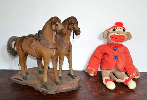 Leather-covered horse pull-toy and Sock Monkey