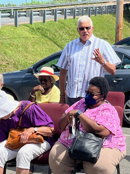 Graham Paige speaks as Fannie Louden sits to his right and Mary Eubanks to his left