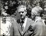Governor Holton and Mayor Thacker examine flood damage, June 1972