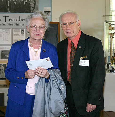 Robert Spencer greeting a visitor to Scottsville Museum at its Spring Opening on  April 05, 2005