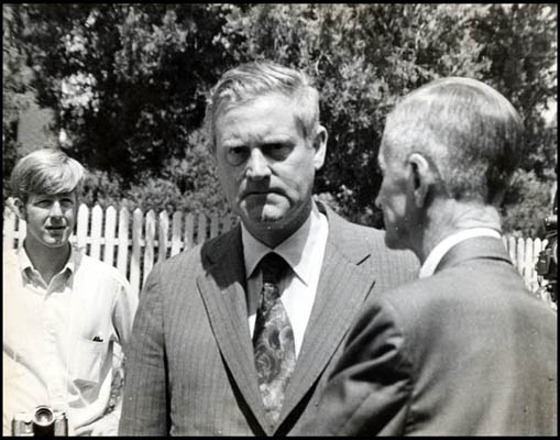 Governor Holton and Mayor Thacker examine flood damage, June 1972