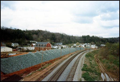First layer of rock for levee laid north of railroad track, 1985