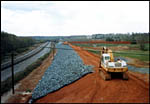 Smoothing out the levee dirt, 1985
