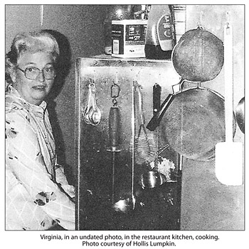 Virginia Lumpkin in Lumpkins' kitchen, undated photo.