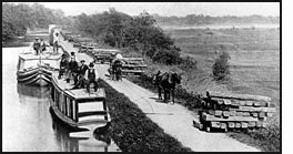 Rail ties laid on canal towpath, 1881